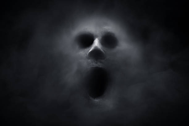 Scary ghost on dark background