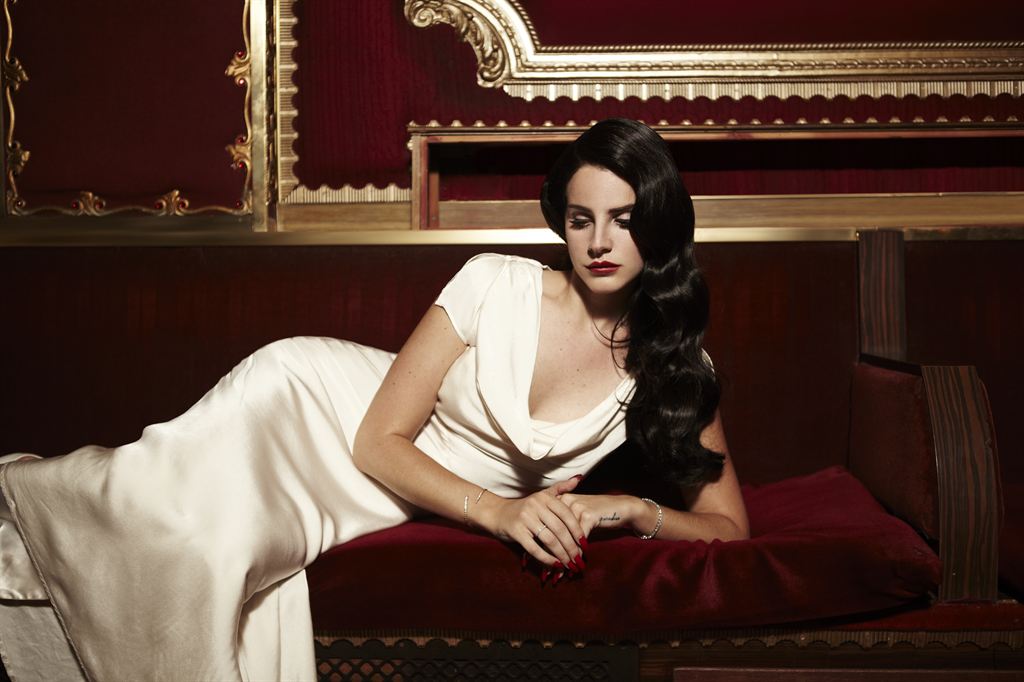 Photo via https://upload.wikimedia.org/wikipedia/commons/6/6d/Lana_Del_Rey_Releases_Music_Video_For_New_Track_%27Burning_Desire%279.jpg under the Creative Commons License
